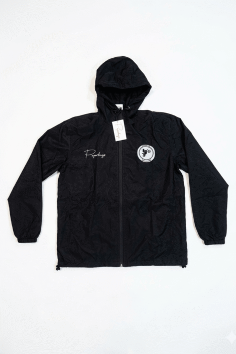 Black Paperboy$ windbreaker jacket with cursive paperboy$ and dirtbike logo