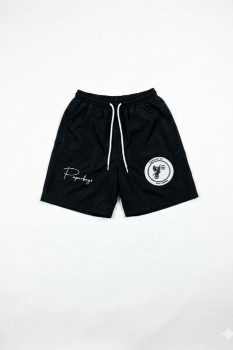 Paperboy$ windbreaker shorts with dirt bike and cursive paperboy$ logo